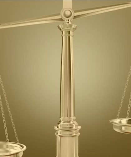 An uneven beam balance scale