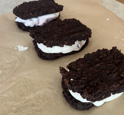Two Homemade Ice Cream Sandwiches on Parchment Paper