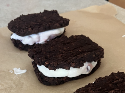 Two Homemade Ice Cream Sandwiches on Parchment Paper