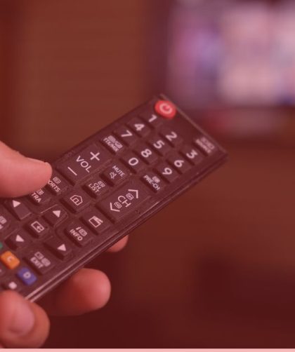 a person holding a remote control