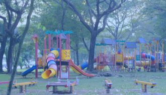 a large fun playground with many slides